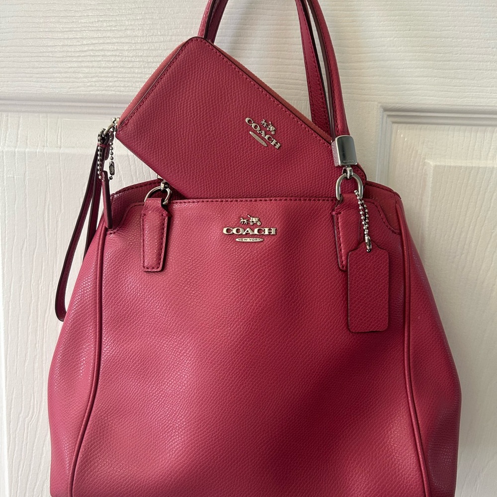 SOLD………Coach New York Hand Bag. Mauve/Berry color with matching wallet.